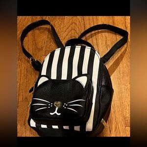 Betsey Johnson cat backpack. Floral lining
